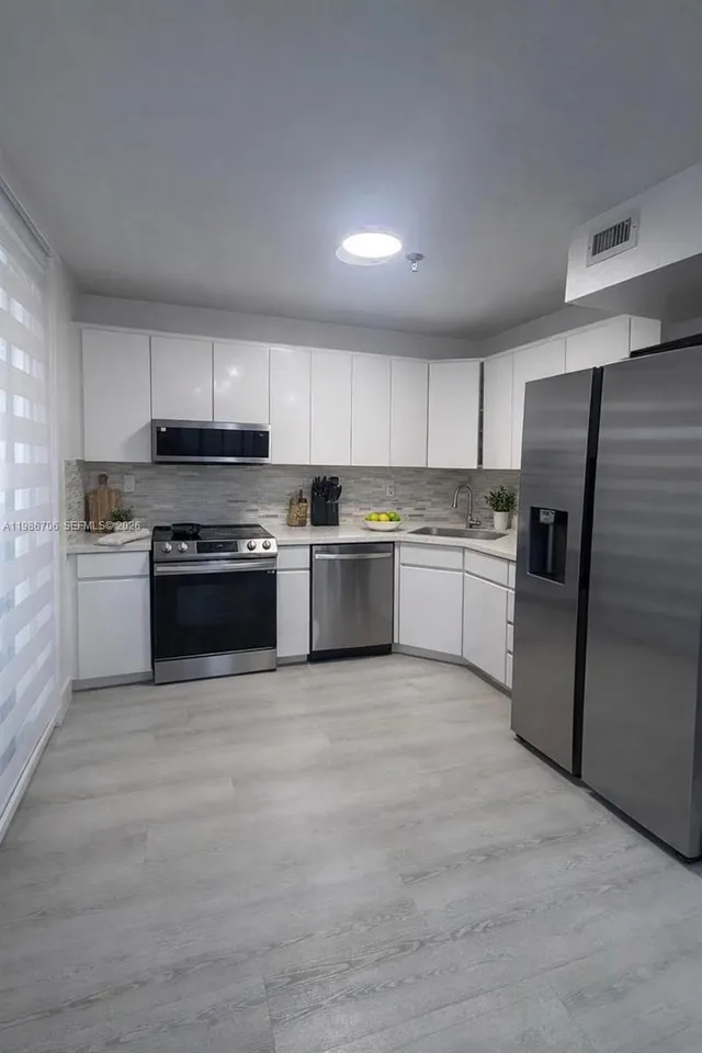 2-bedroom home at 671 NE 195th Street #219E, Miami