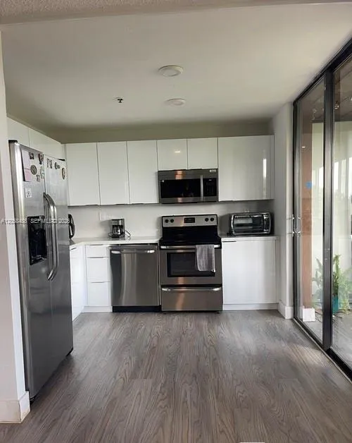 2-bedroom rental at 671 NE 195th Street #404E, Miami