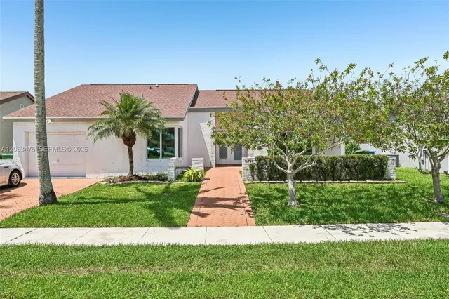 4-bedroom home at 16791 Royal Poinciana Drive, Weston