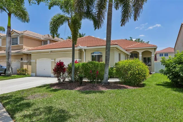 4-bedroom home at 1290 Camellia Lane, Weston