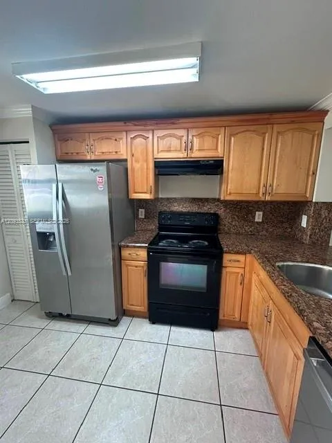 2-bedroom rental at 911 NE 209th Terrace #102-27, Miami