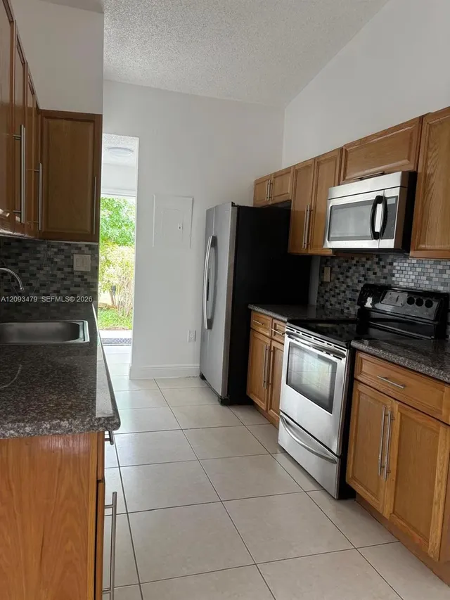 3-bedroom rental at 815 NE 213th Terrace #815-04, Miami
