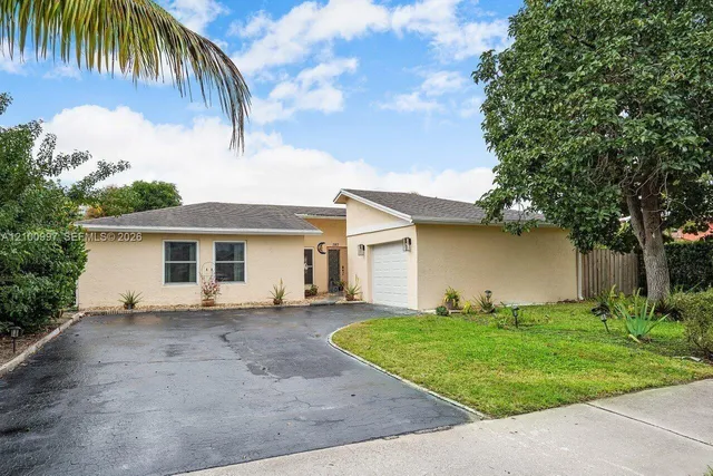 4-bedroom home at 387 NW 39th Way, Deerfield Beach